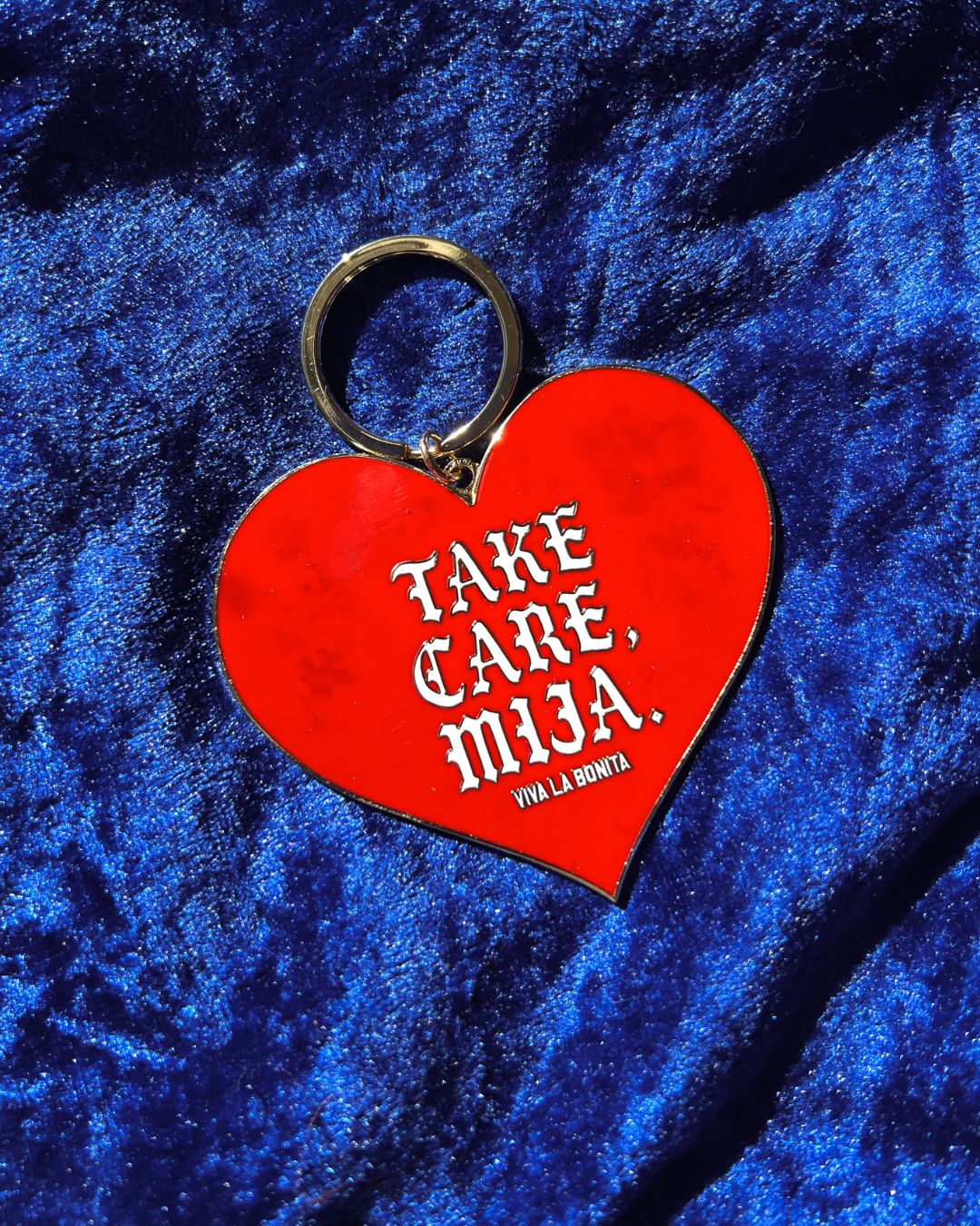 TAKE CARE MIJA HEART SHAPED KEYCHAIN