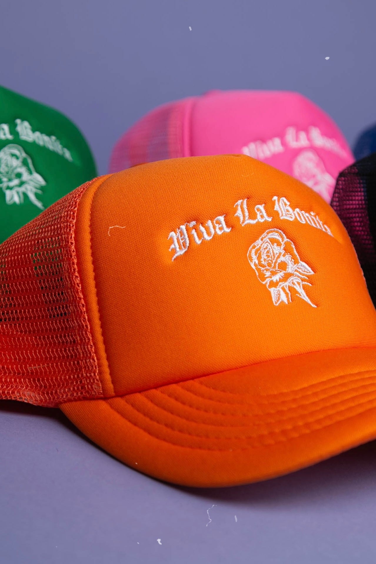 ORANGE LA ROSA TRUCKER HAT